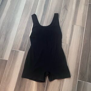 Black SKIMS bodysuit unitard